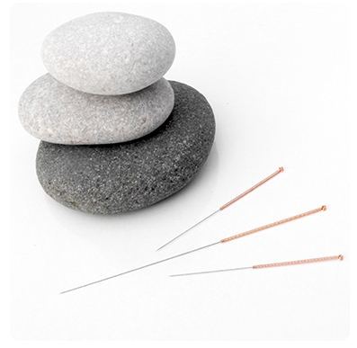 Stacked Stones & Acupuncture Needles