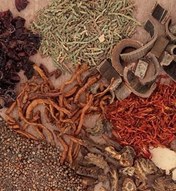 piles of multicolored dried herbs