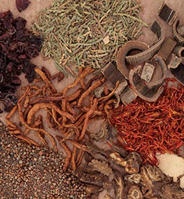 piles of multicolored dried herbs